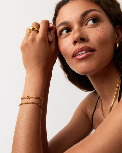 Kinetic Duality Charm Bracelet | 18ct Gold Plated Cubic Zirconia